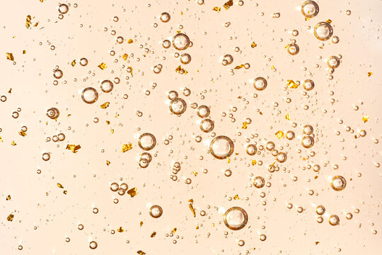 Abstract textures with gold flakes and bubbles