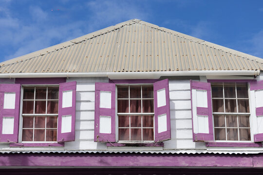 Colorful shutters on historic building in Redcliffe Quay