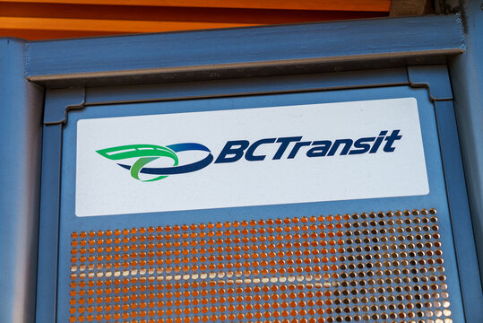 Close up bus stop with BC Transit sign logo 