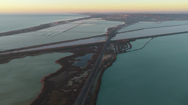 Aerial view of salinas de santa pola road at sunset