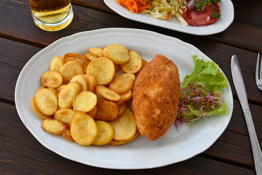 Devolay cutlet with potatoes and salad