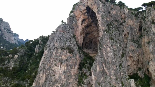 Aerial view of the Grotta delle Felci cave on the island of Capri, Italy. Video of the Grotta delle Felci, a large prehistoric cave located on the southern coast of Capri.