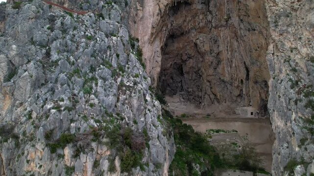 Aerial view of the Grotta delle Felci cave on the island of Capri, Italy. Video of the Grotta delle Felci, a large prehistoric cave located on the southern coast of Capri.