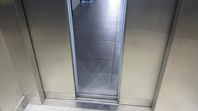 Close-up of elevator doors opening