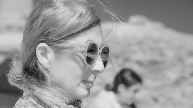 Thoughtful woman portrait outdoors with infrared photography dramatic surreal view