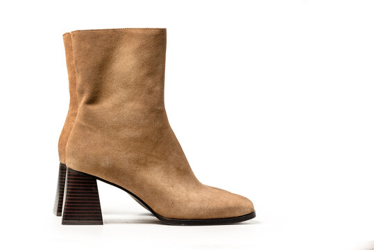 Brown Female Suede Heeled Ankle Boots. Female Fashionable Footwear For Autumn Isolated On White Background. Clipping path included