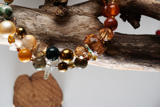 different   bracelets with beige and rgolden semipreciouse stones with natural lava, shungite,  agat,  rhodonite, and others.  top view