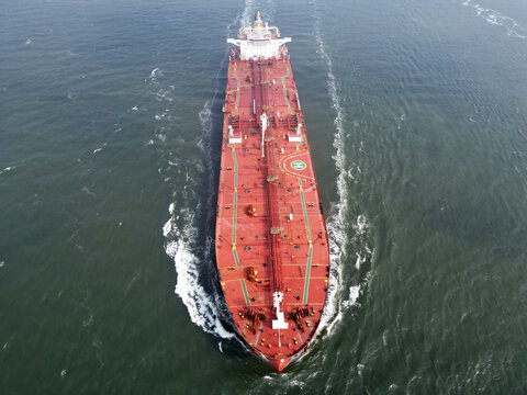 Aerial view of a large oil tanker approaching the port of Rotterdam