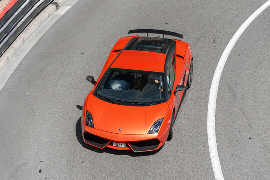 Monte Carlo, Monaco - June 1st 2019 : View on an orange Lamborghini Gallardo LP 570-4 Superleggera Edizione Tecnica driving on the road in the Fairmont Hairpin.