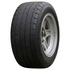 Close-up of a worn automotive performance tire mounted on a silver alloy rim, isolated on a clean white background.