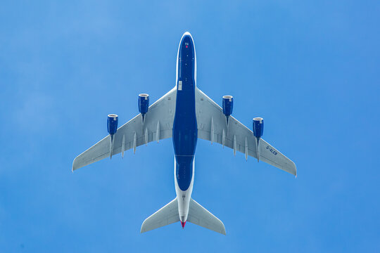 London, UK - 14th February 2026, An underside view of a British Airways Airbus A380- 841, registration G-XLE, departing London Heathrow (LHR) for Dubai (DXB).