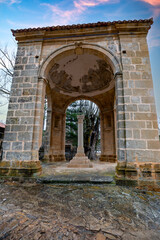 Fototapeta premium Humilladero of Alcalá de la Selva, Teruel, Aragon, Spain, at sunset