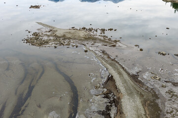 Exposed Lake Shoreline With Tree Stumps and Erosion on a Low Water Lake in BC, Canada