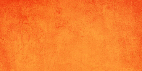Fototapeta premium Vintage orange paper texture featuring an aged grunge pattern with a stained antique surface and blank parchment design for an abstract retro backdrop