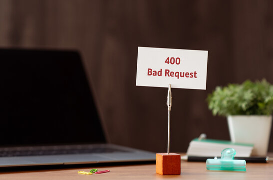 Modern technology concept of 400 Bad Request on card with laptop, clips. Digital innovation and connectivity visualization.