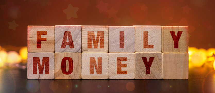 Wooden blocks spelling family money for inheritance and generational wealth planning