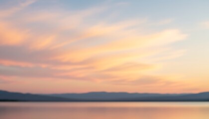 Obraz premium Soft Blurred Sunset Over Calm Water