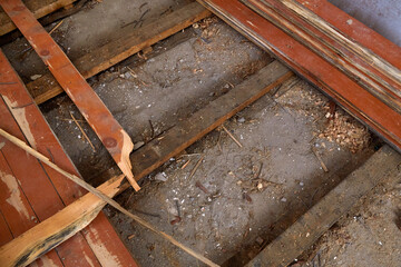 The house is undergoing renovation work to replace the old wooden floors