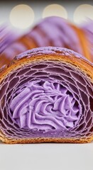 Obraz premium Delicious Ube Croissant with Cream Filling.