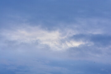 Obraz premium Blue sky with soft clouds and natural daylight atmosphere