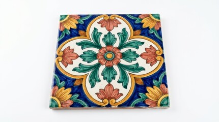 Obraz premium Ornate Hand-Painted Ceramic Tile with Intricate Floral and Leaf Pattern in Vibrant Blue Green and Orange Hues on White Background
