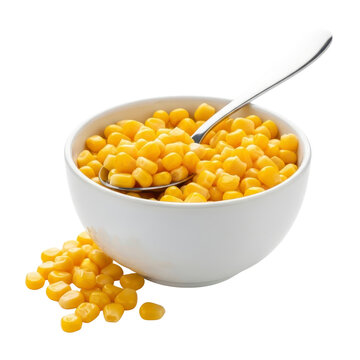 Bowl of corn with spoon and scattered kernels