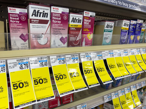 Allergy Nasal Spray Medications On Pharmacy Shelf With Discount Sale Tags