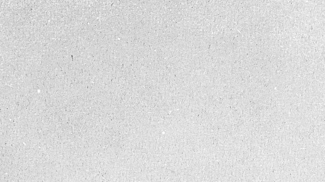Minimalist gray textured background with subtle paper grit and grainy surface, perfect for clean design overlays and creative professional projects.