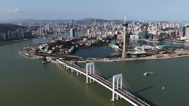 Aerial macau tower convention cityscape and sai van bridge