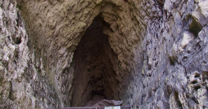 shot of in a cave in chalk cliffs at Kingsgate beach bay. At low tide with a light hole.