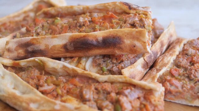 Turkish pide bread with minced meat and vegetables