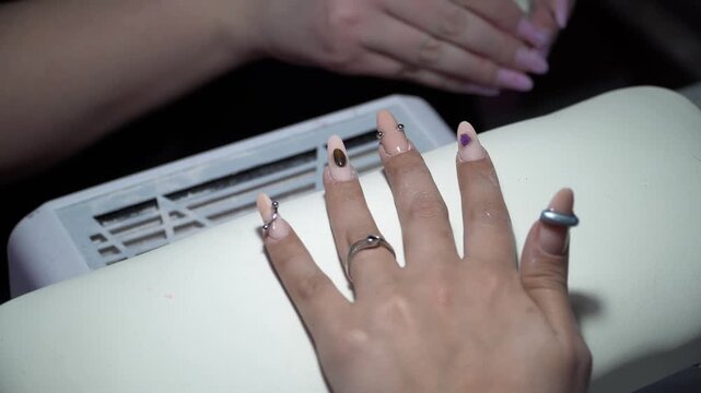 Creative Manicure Styling on Woman&rsquo;s Fingers in Professional Nail Salon.
