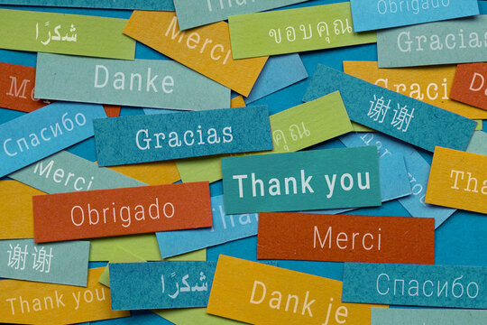 thank you in many different languages, gratitude concept, word thank you on colorful papers, gracias merci danke