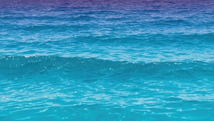 Obraz premium Azure ocean waves and ripples in various shades of blue and violet reflecting sunlight