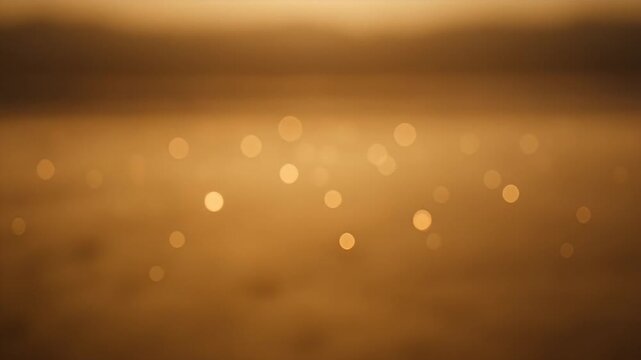 Golden Bokeh Lights Floating in a Muted Brown Atmosphere Creating Serenity