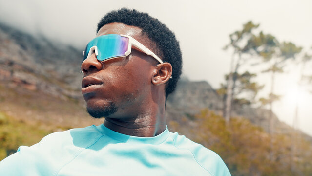 Thinking, outdoor and black man with exercise, sunglasses for uv protection and challenge. Nature, reflection or person with shield eyewear, polarized lenses or workout for health benefits or fitness