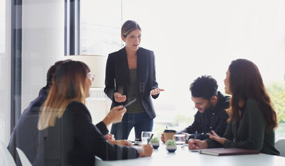 Obraz premium Presenter, coaching and business woman with team for compliance, briefing or pitch idea in office. Presentation, speaking and group in meeting for policy planning, training and strategy in company