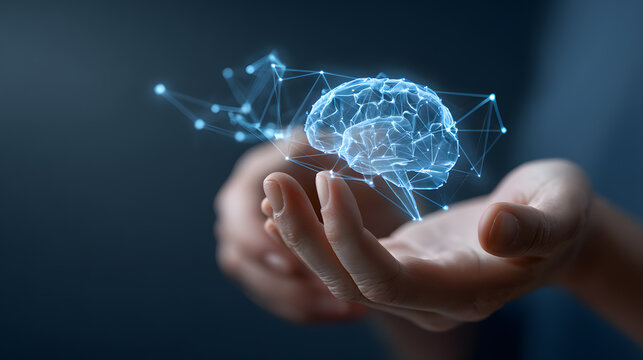 A 3D render of a glowing blue brain held gently in a person's palm, set against a dark background. The image signifies technology, knowledge and intelligence. 