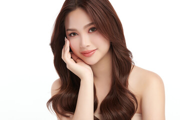 Fototapeta premium A beautiful young Asian woman with clean, fresh skin against a white background. Skincare, facial treatment, cosmetology, beauty, and spa. An elegant portrait of an Asian woman.