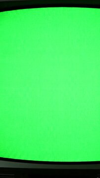 Chromakey Screen Element with 1990 s tv slow push in green distortion, overlay, glitch, static noise, scan lines on black background, 4k animated video loop