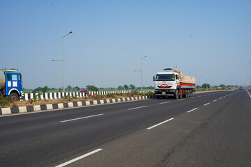 Naklejka premium indian semi truck running on highway road