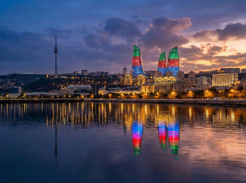 Baku nights: When the skyline comes to life twice. Flame Tower Reflection on Caspian Sea