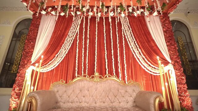 Vibrant Marigold Floral Chains: Traditional Wedding Hall Decor in India