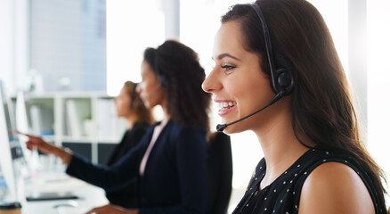 Happy woman, consultant and agency with headset for customer service in call center office. Female...