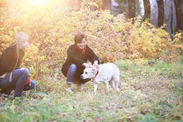 Fototapeta premium Young girl on a walk in the autumn