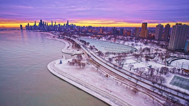 Dramatic drone shot of downtown Chicago&rsquo;s Loop at dawn in winter.