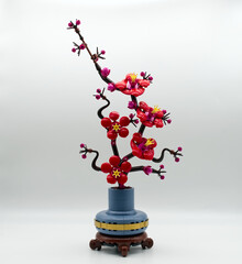 Fototapeta premium Bologna - Italy - March 3, 2026: LEGO Botanicals Plum Blossom set 10369 isolated on white background.