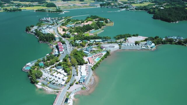 Aerial View of Bito Island in Sacheon with Emerald Sea, South korea