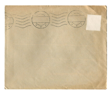 Vintage brown postal envelope with postmark lines and blank stamp area isolated on white