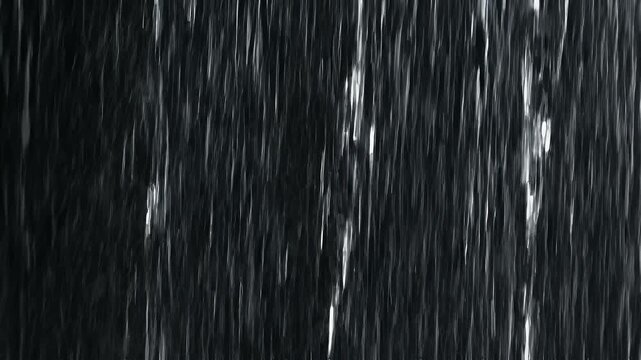 Close-up of cascading water droplets creating a textured pattern against a dark background for serene and calming ambiance